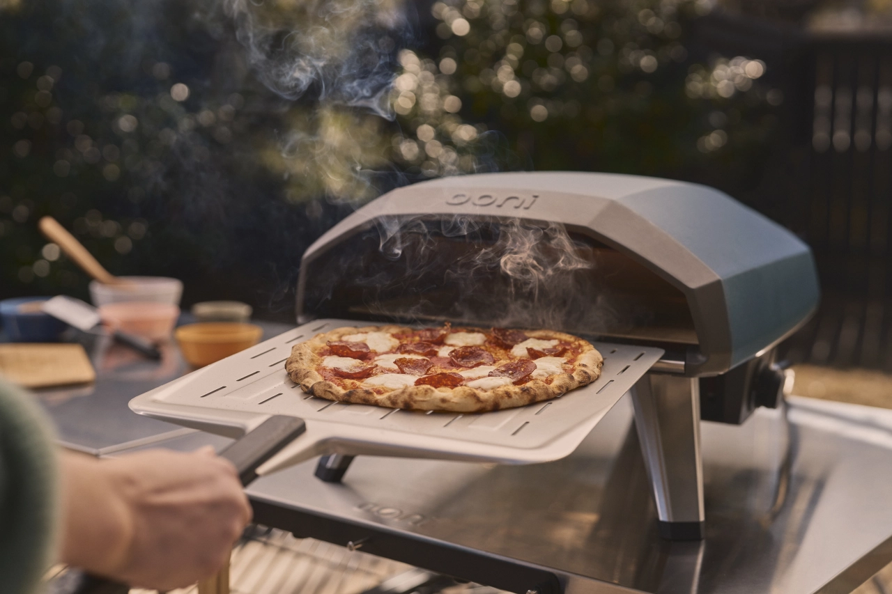 Pizza wird belegt